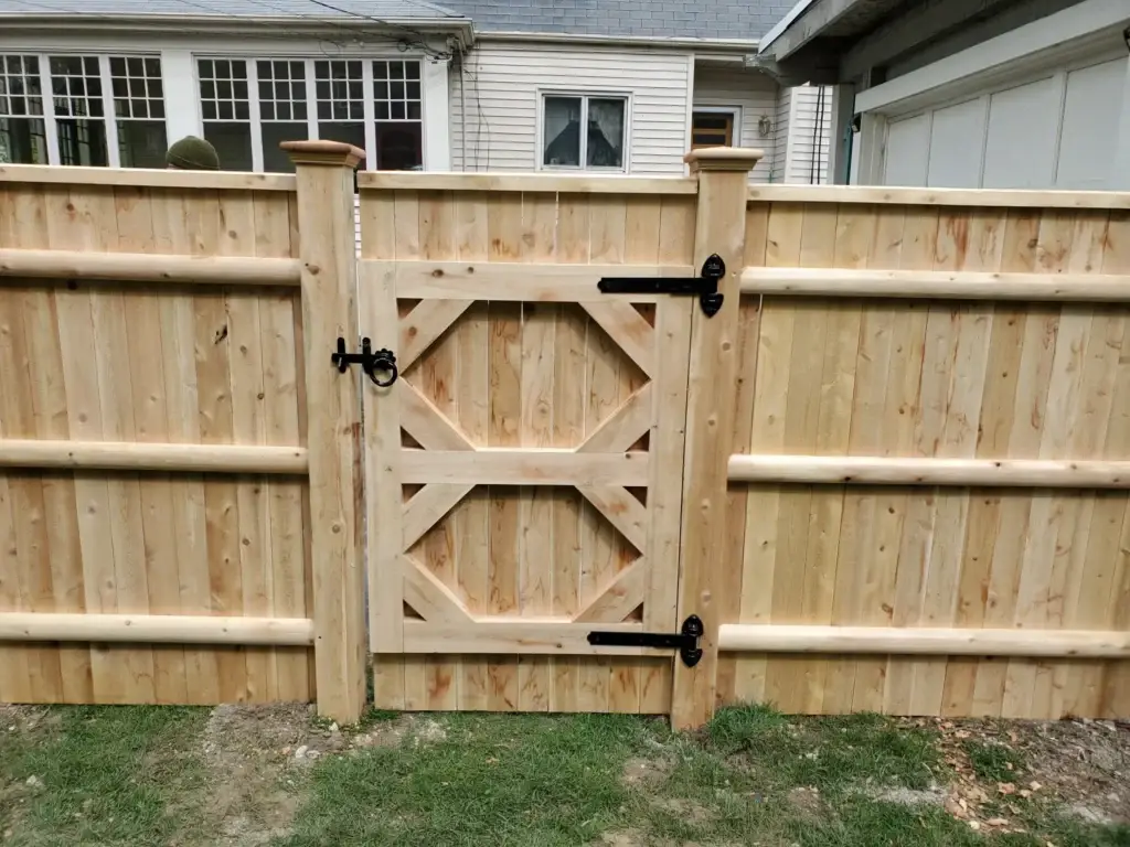 No-dig fence post system installation demonstrating enhanced durability for cedar fences