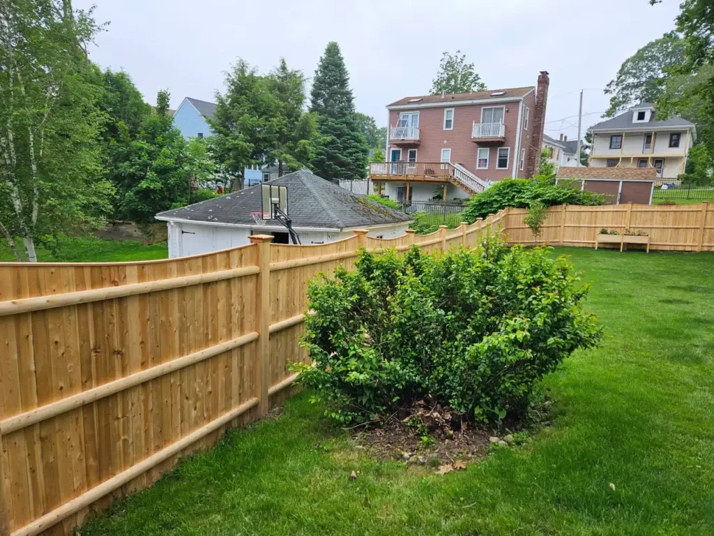 Cedar privacy fence installed by Olympic Fence Company in a North Shore Massachusetts neighborhood.